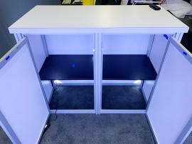 RENTAL: Modified RE-1077 with Storage Closet with Locking Door, (2) Lightboxes, 47" Monitor, RE-1567 Backlit Counter, and SEG Fabric Graphics